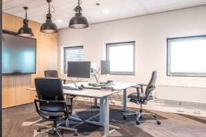 Modern Office Space with Desks and Computer Monitors